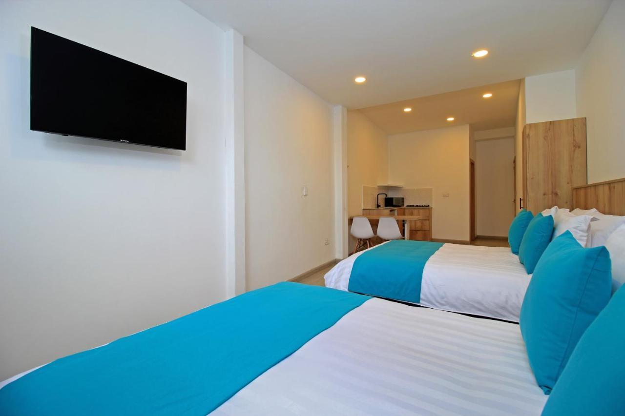 Apart Hotel Casa Blanca Cuenca Exterior photo